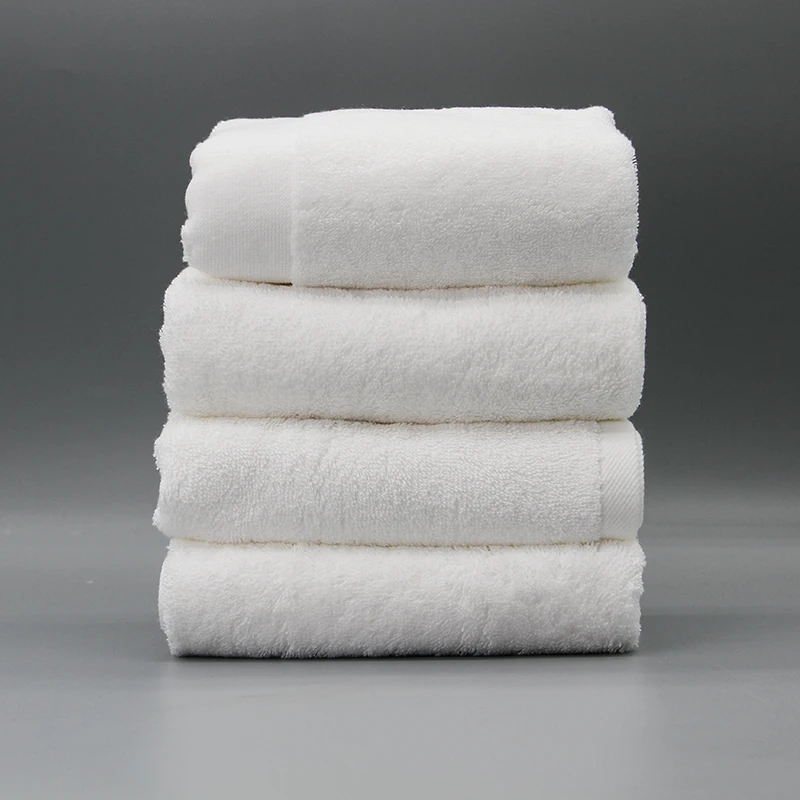 Luxury 100% Cotton Bath Towel Set Custom Jacquard Logo Quick-dry Compressed Knitted Solid Color Disposable For Spa Hotels