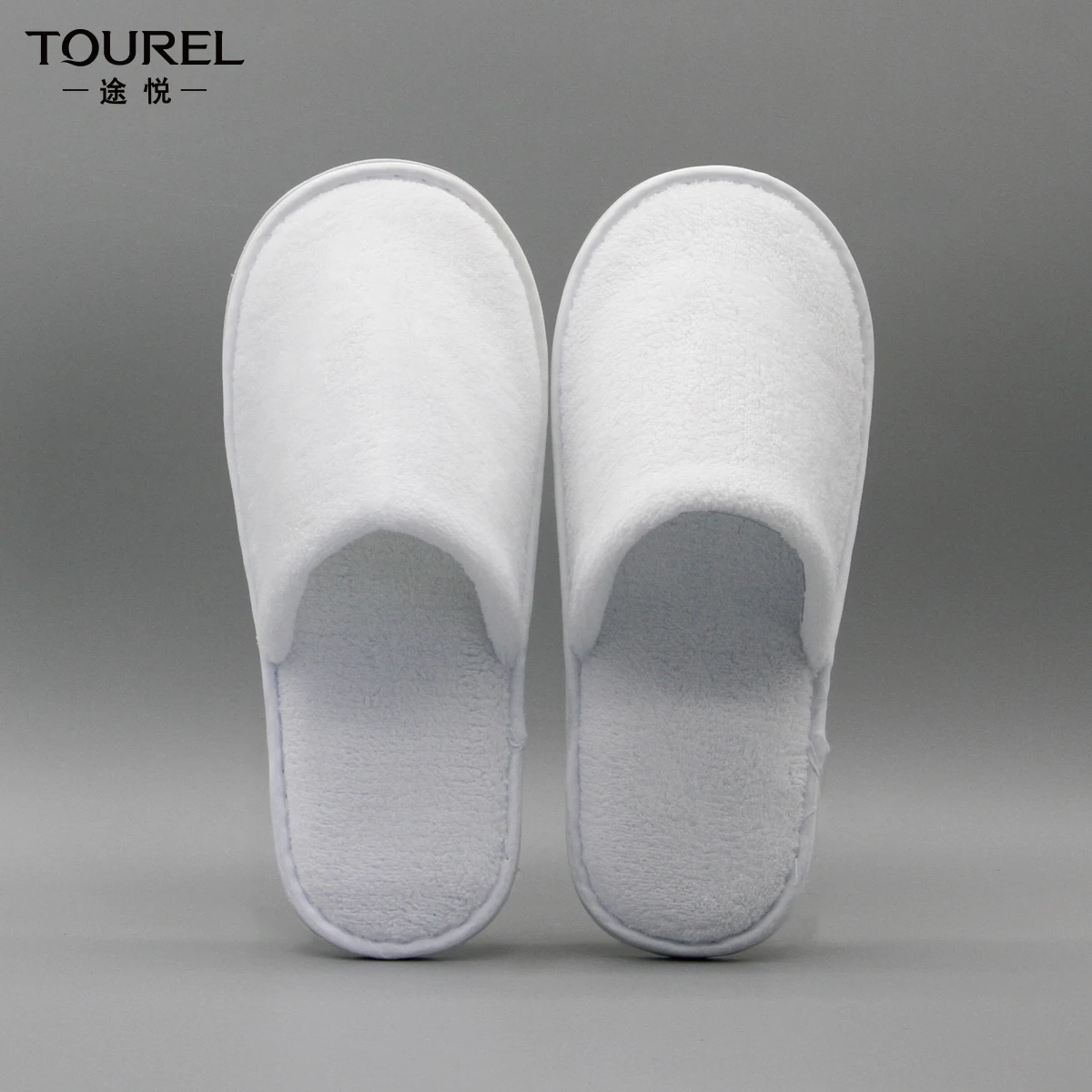 Zapatillas de spa personalizadas de punta cerrada en blanco, cómodas para las cuatro estaciones, suaves para baño, desechables para hoteles, artículos de hotel