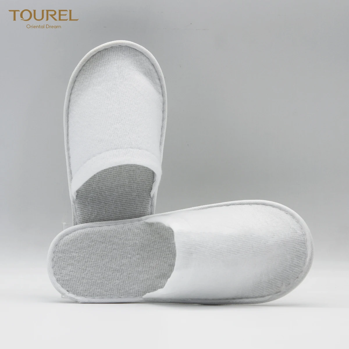 Zapatillas de hotel desechables ecológicas de vellón de coral blanco para mujer