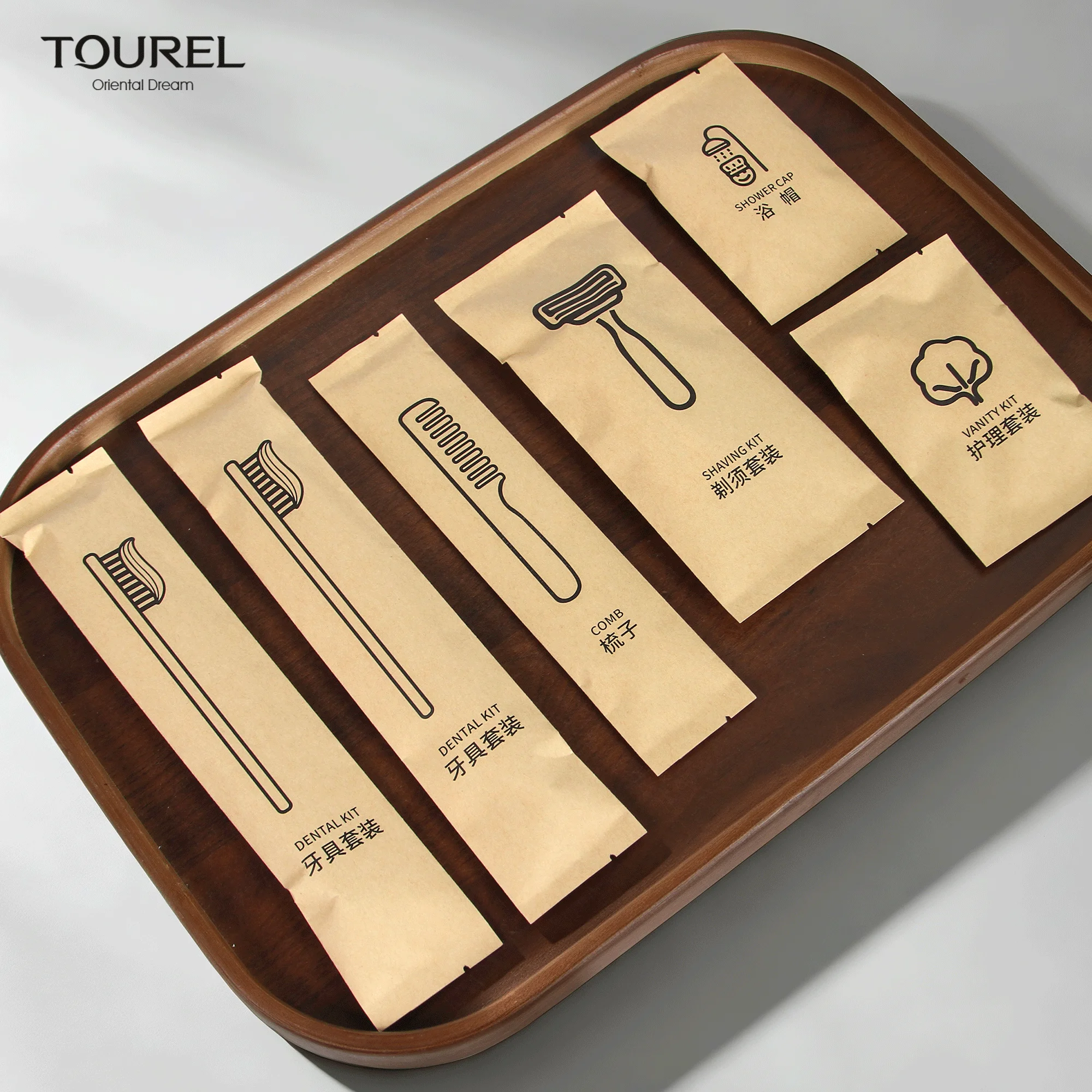 Wholesale Biodegradable Hotel Disposable Toiletries Set Kraft Paper Bag Straw Toothbrush Comb Custom Logo For Hotel